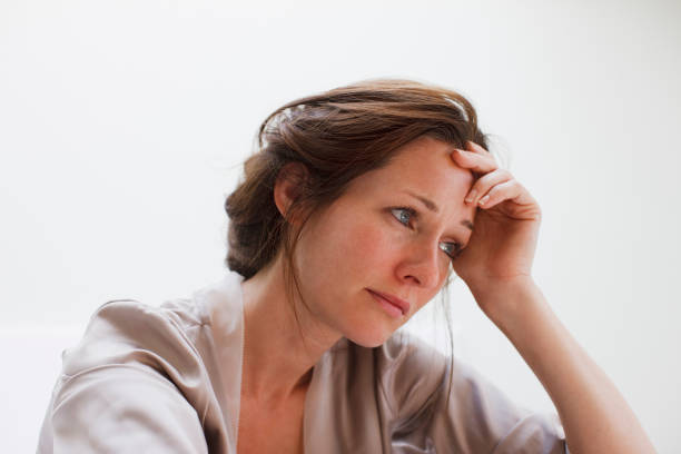 A woman taking a steadying moment to herself